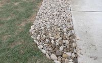 Edge river rocks 1-3 inch  by Velazquez Landscaping LLC