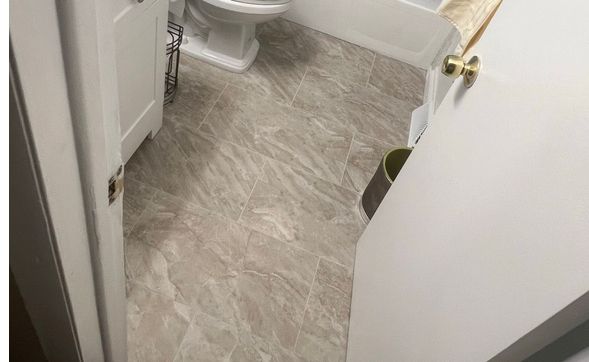 Bathroom Floor Tile Replacement with Heated Mats for Comfort