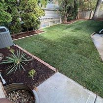 Small backyard Landscape Design  by Strong Arm Services LLC