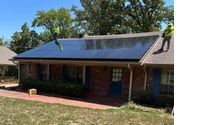 Rooftop solar panel install  by Summer McAlister