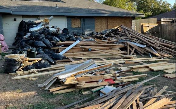 Property clean up and haul away by Strongman construction clean up residential and commercial