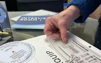 Braille and Raised Character Sign Check Service by H Toji and Company and Access Communications