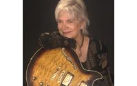 Live background music offers classy touch. by Karen Cannon Guitarist
