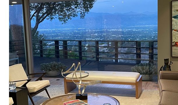Sunset Strip/Hollywood Hills home with view at dusk by Michael Collins - Coldwell Banker Global Luxury