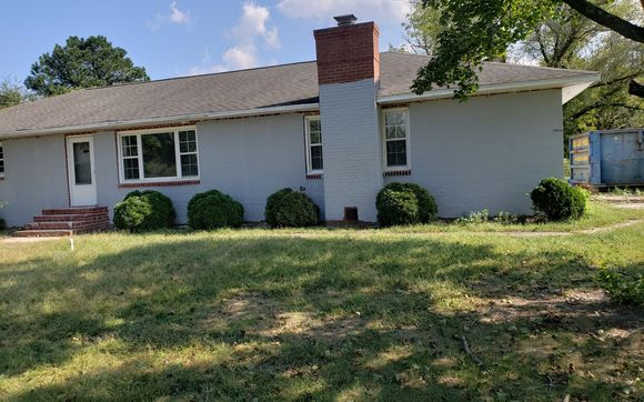 Exterior Painting for Your Homered brick to gray by Turn Key Construction, LLC