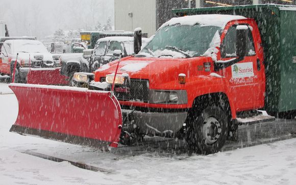 Snow Plowing by Sunrise Landscape + Design