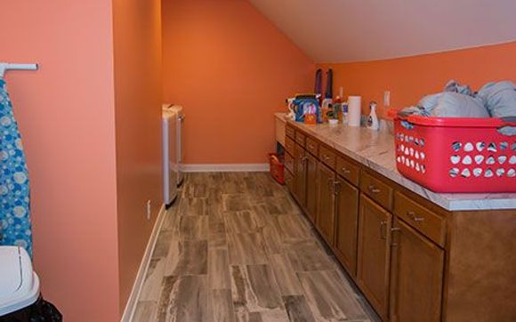 Hardwood Floor Installation by On Top of It Roofing and Construction