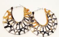 Large crochet hoop earrings by Designsbyyasmen