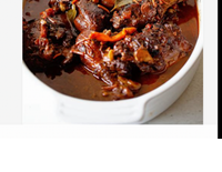 Stew Chicken  by Trinbago Caribbean Restaurant