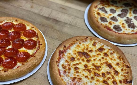 Sundays:Buy any three & get one cheese free! by Moore Pizza