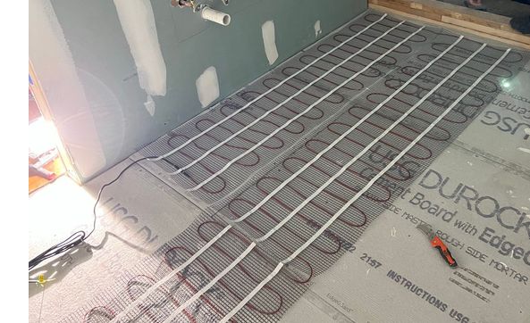 Radiant floor installation  by Mendez Electrical Services, LLC
