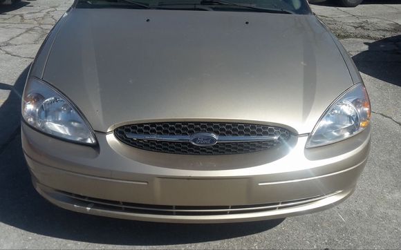 Headlamp re-store.          $49.99 by Opie's Auto Re-Store LLC.