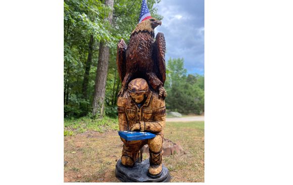 Master of the Chainsaw by Nature’s Wonderland Carvings