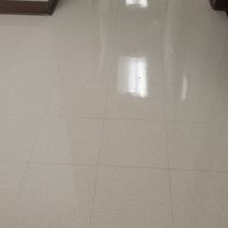 Mirror floors - highly reflective VCT tile floors by MICKELSON COMMERCIAL JANITORIAL  LLC.