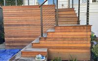 Wood deck  by True Magic Landscaping