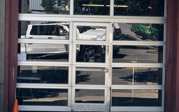 Garage doors & operators  by Pro Door Doctor