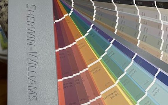 Paint and wall paper selections by Metamorph Home Design LLC