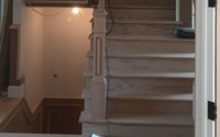 Custom stairs and trim-full oak treads by MJC EAST LLC