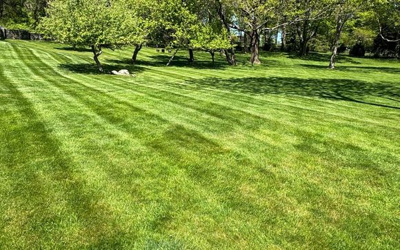 Lawn Maintenance  by Hultstrom's Landscaping