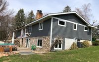 Siding Replacement by Seasons View Window and Door