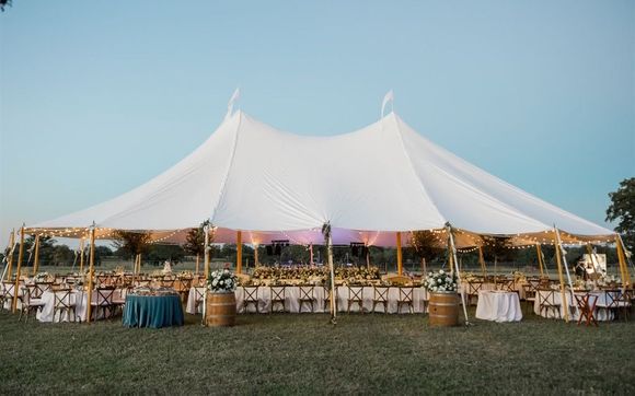 Tent, tables and chairs  by Glamour Event Rentals