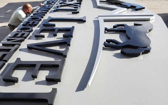 Reverse Channel Letter on Back Plate  by Miami Electrical Signs .Inc