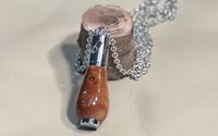 We specialize in pens, handles, necklace pendants, and bottle stoppers with one of a kind designs. by Write By Us