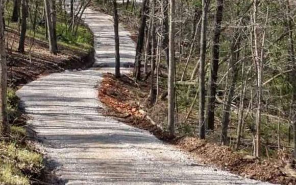 Cut in drive into virgin hillside complete with correct drainage by Got Dirt? Custom Dozer Work 1993