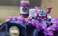 Candles of different fragrances and colors by Kelley’s Quality Candles