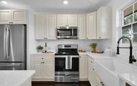 Pearl White Shaker  by L&C CABINETRY