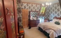 Suites by Pella Mansion Bed and Breakfast