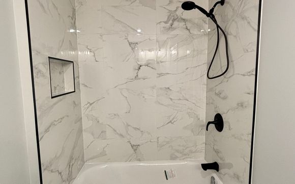 Tub & Shower Tiles and Installation by CAH Master Construction & Renovation Inc.