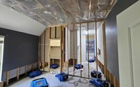 Water Damage caused by water heater in attic by Dri-Tex Restoration
