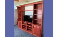 Custom Traditional Entertainment Center in Red Head Stain on Maple by Accent Woodworking Inc.