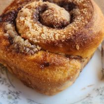 Peach cinnamon rolls  by Aunt Bea's Cupcakes
