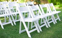 White Resin Garden Chairs by Serendipity Event Rentals