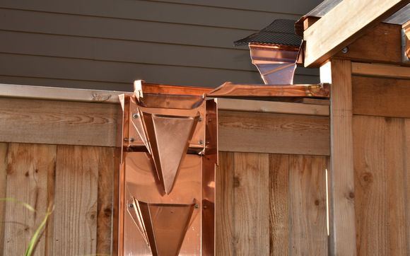 Custom copper rain-cup downspout by DMR-Gutters & Copper-By-Design