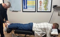 Adjusting with many techniques by 2 Better Health Chiropractic
