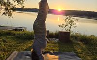 Waterfront Sun Salutations at Eliken House  by Eliken House