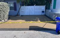 Permeable Resin bound stone driveway  by Southernmost Surfacing