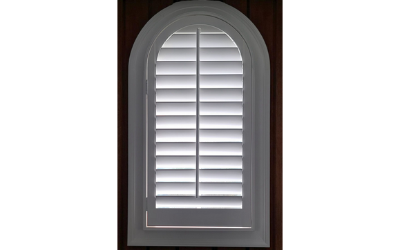 Arch top panel plantation shutter  by Monroe Plantation Shutter Pros