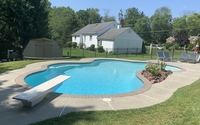 Concrete pool renovation including tile, coping and plaster.   by Brighton Pools