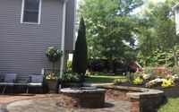 Bench wall, circular paver patio with fire-pit  by  Done Right Landscape & Construction Co. Inc Design / Build Services