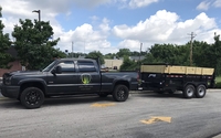 Debris removal and dumpster rental by A Cut Above The Rest Lawn Care LLC