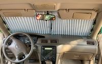 Retractable car window shade by Service First Installers