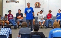 Weekly, in-school group mentoring by Boys to Men Mentoring Network