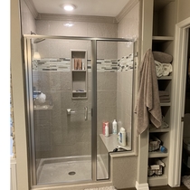 Onyx shower tile insert  by Beyond Cabinets & Design LLC