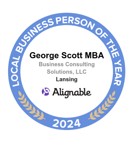 George Scott's Winning Badge As Lansing, MI's 2024 Local Business Person Of The Year
