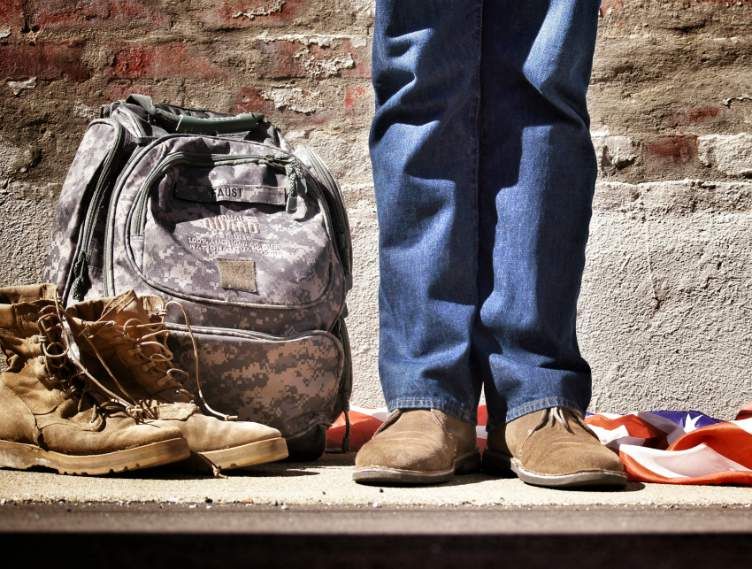 military man with army backpack and boots