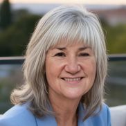 Lorri Dumke from Triple R Real Estate LLC
